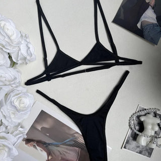 Demeter black micro bra and G-string laid flat