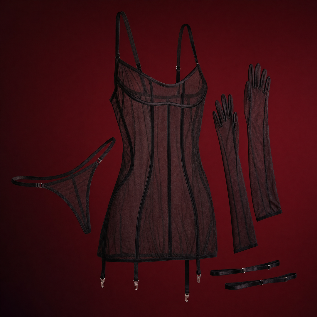 Mesh chemise with garter straps on a burgundy studio backdrop