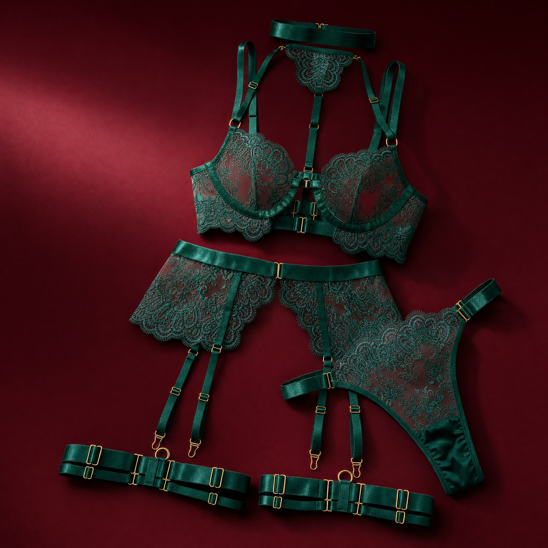 Five-piece embroidered lace set on a burgundy studio backdrop