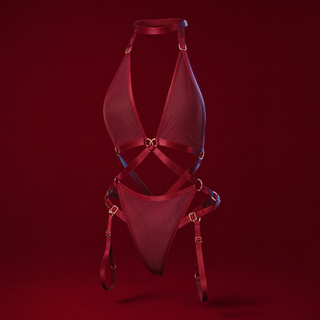 Iris burgundy strappy mesh bodysuit on a burgundy studio background