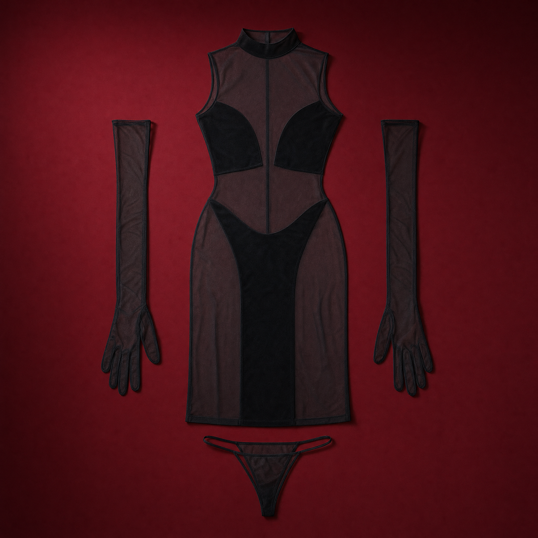 Zelda sheer black mesh dress with long gloves and thong on a deep burgundy studio background